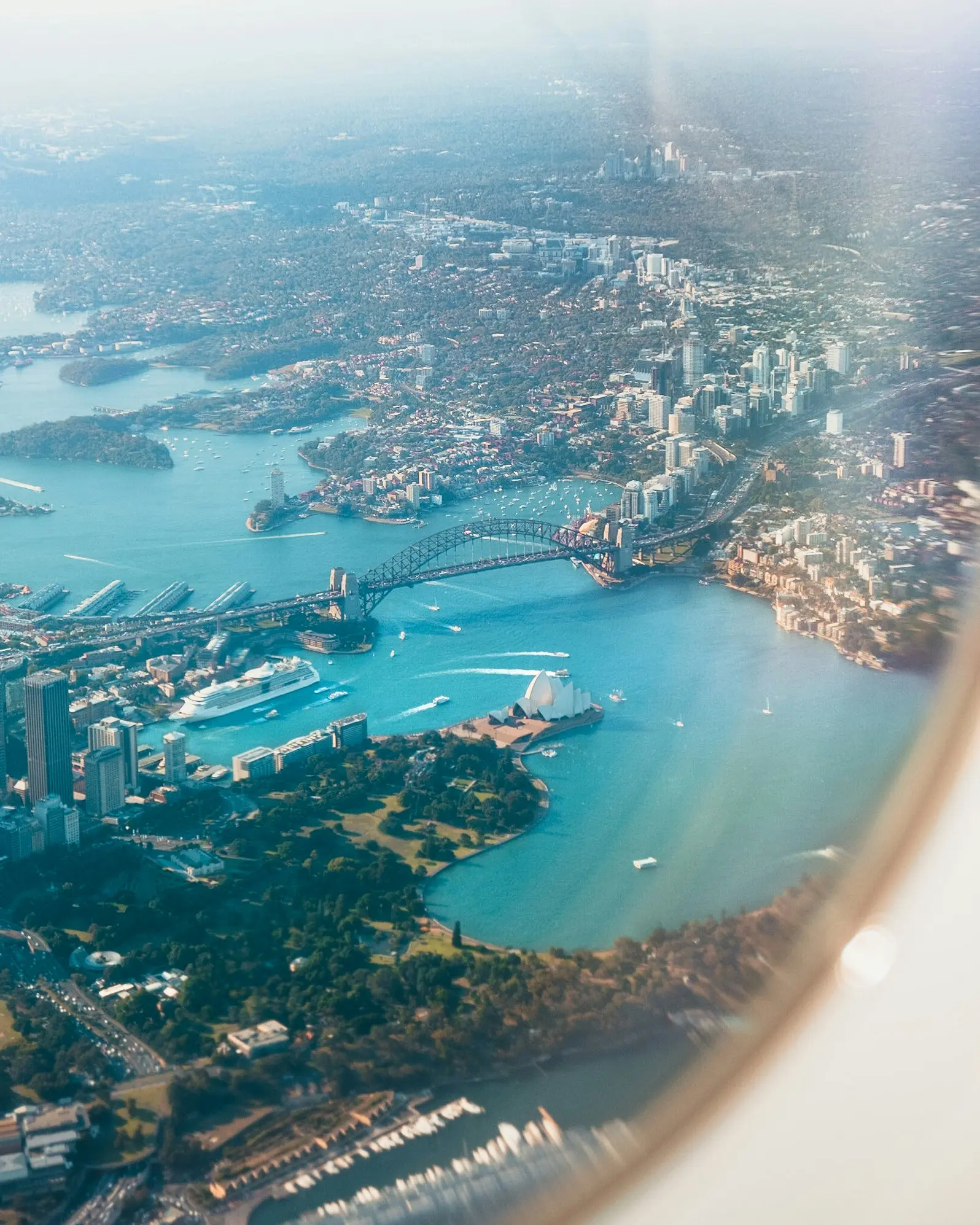 A plane over the Sydney skyline.
